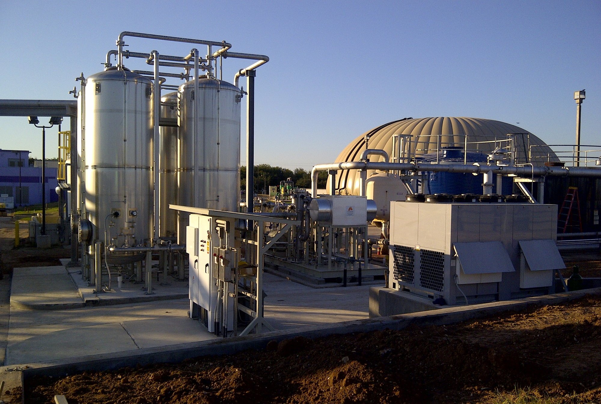 Industrial energy and utility systems at an operational facility, including tanks, piping, and control equipment supporting resilient power and infrastructure performance.