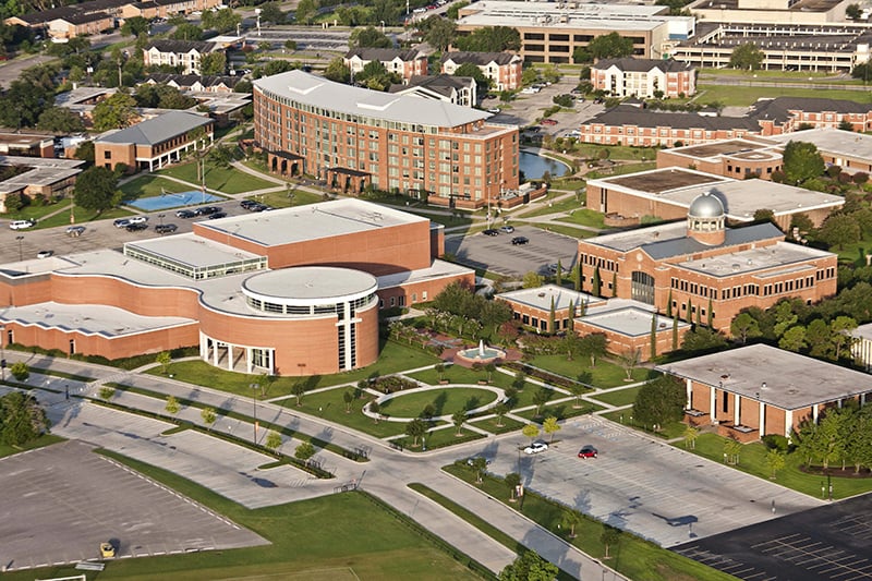 Aerial view of Houston Christian University campus highlighting facility modernization and operational efficiency improvements.